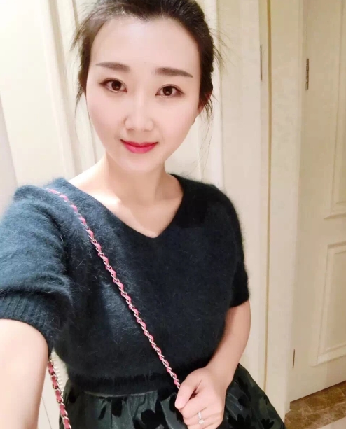 小妮的第三张照片--明溪婚介网